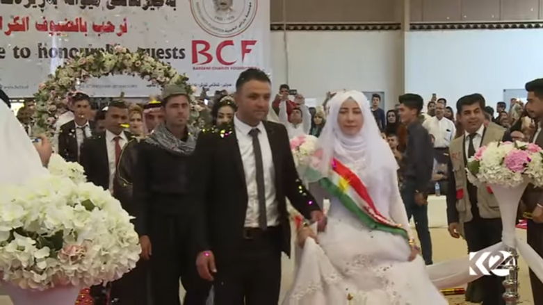 بالصور.. اربيل تحتضن عرسا جماعيا لـ 214 شابا وشابة